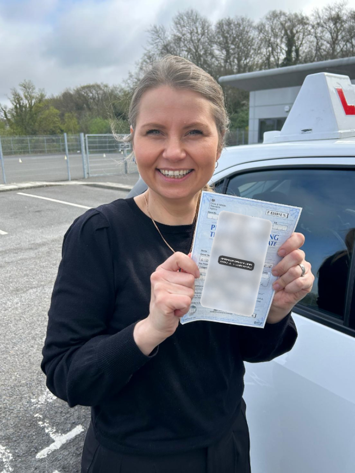 Passed learner holding a privacy-protected practical driving test certificate